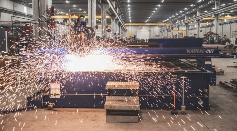 CNC Table CNC Table cutting metal with sparks flying
